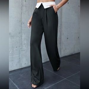 Fold over style waistband, baggy wide leg pants. Never worn!